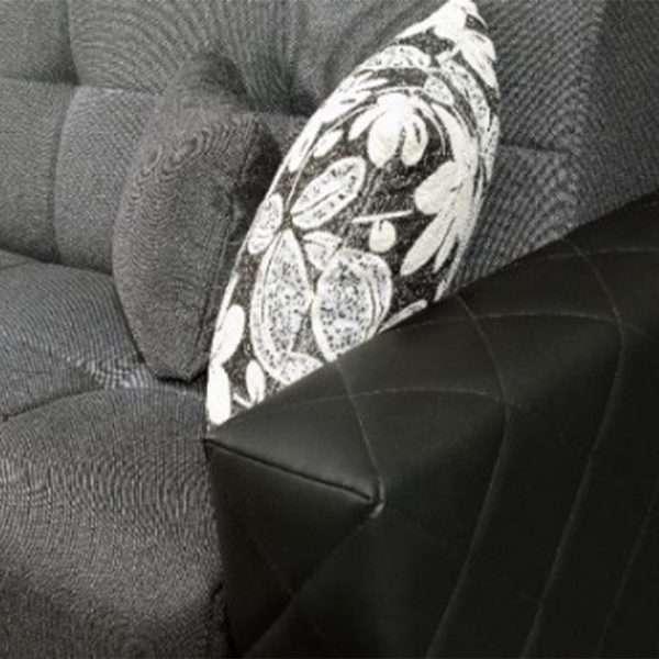 Gray sofa with a decorative pillow 